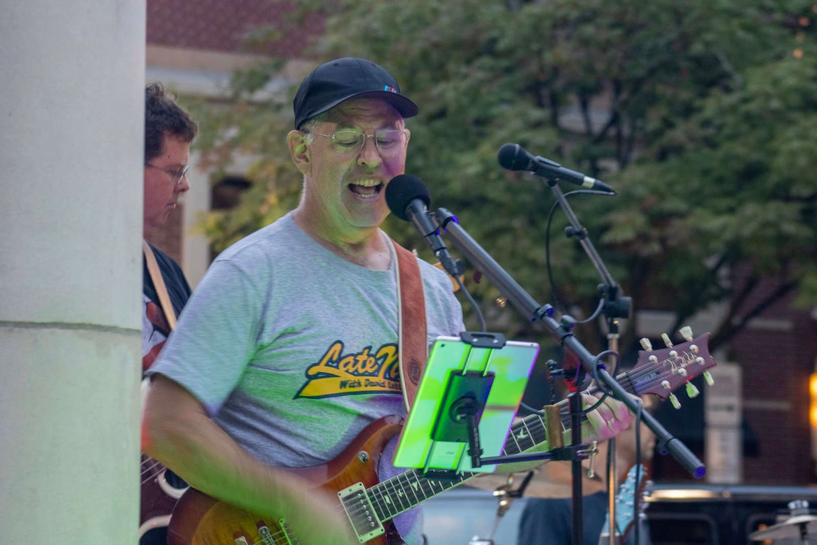 Man performing at an outdoor concert