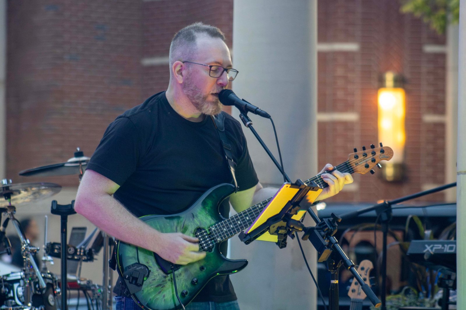 Man performing at an outdoor concert