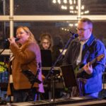 Musicians performing at a concert.