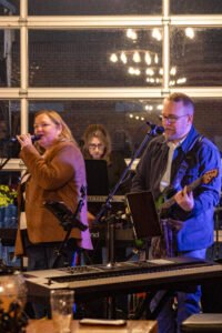 Musicians performing at a concert.