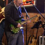 Man performing at a concert.