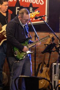 Man performing at a concert.