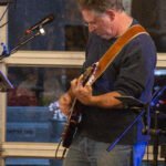 Man performing at a concert.