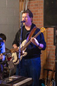 Man performing at a concert.