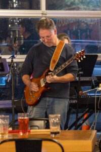 Man performing at a concert.