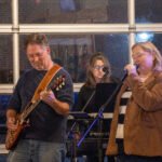 Musicians performing at a concert.