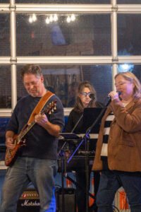 Musicians performing at a concert.