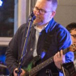 Man performing at a concert.