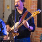 Man performing at a concert.