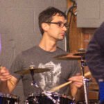 Man performing at a concert.