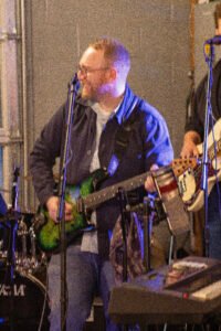 Man performing at a concert.