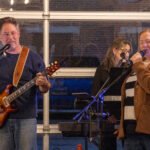 Musicians performing at a concert.