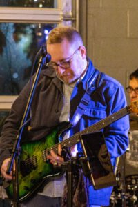 Man performing at a concert.